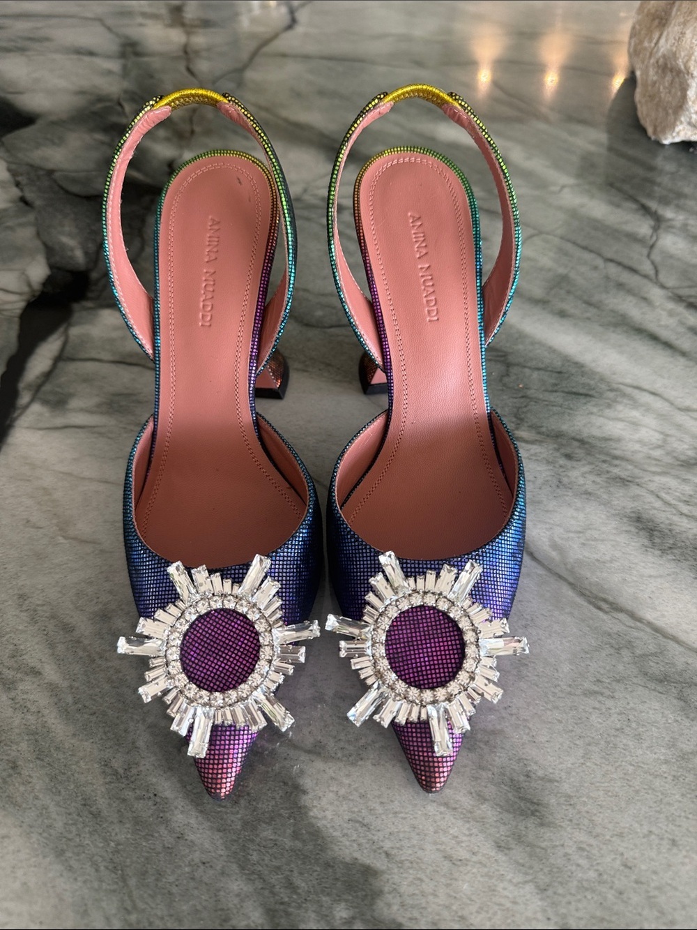Amina Muaddi Iridescent Purple Pointed Slingback Heels with Crystal Sunburst
